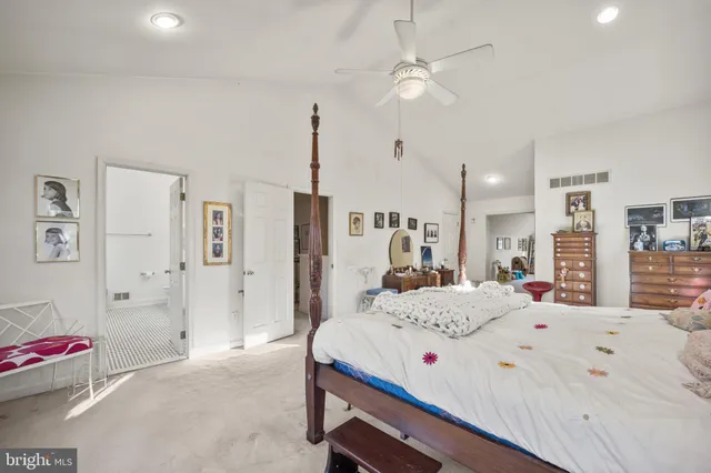 a balcony with table and chairs