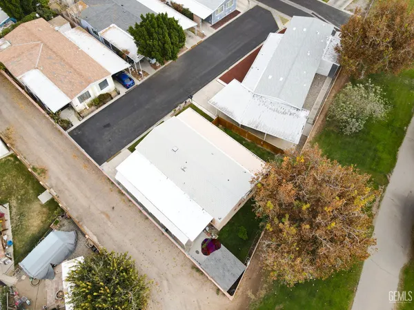 an aerial view of house with yard