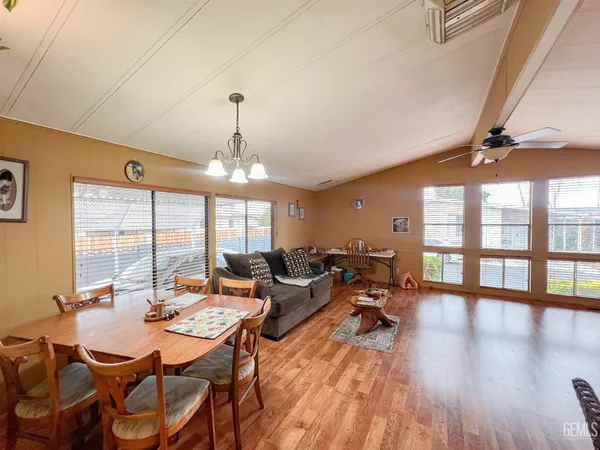 a very nice looking living room with a large window