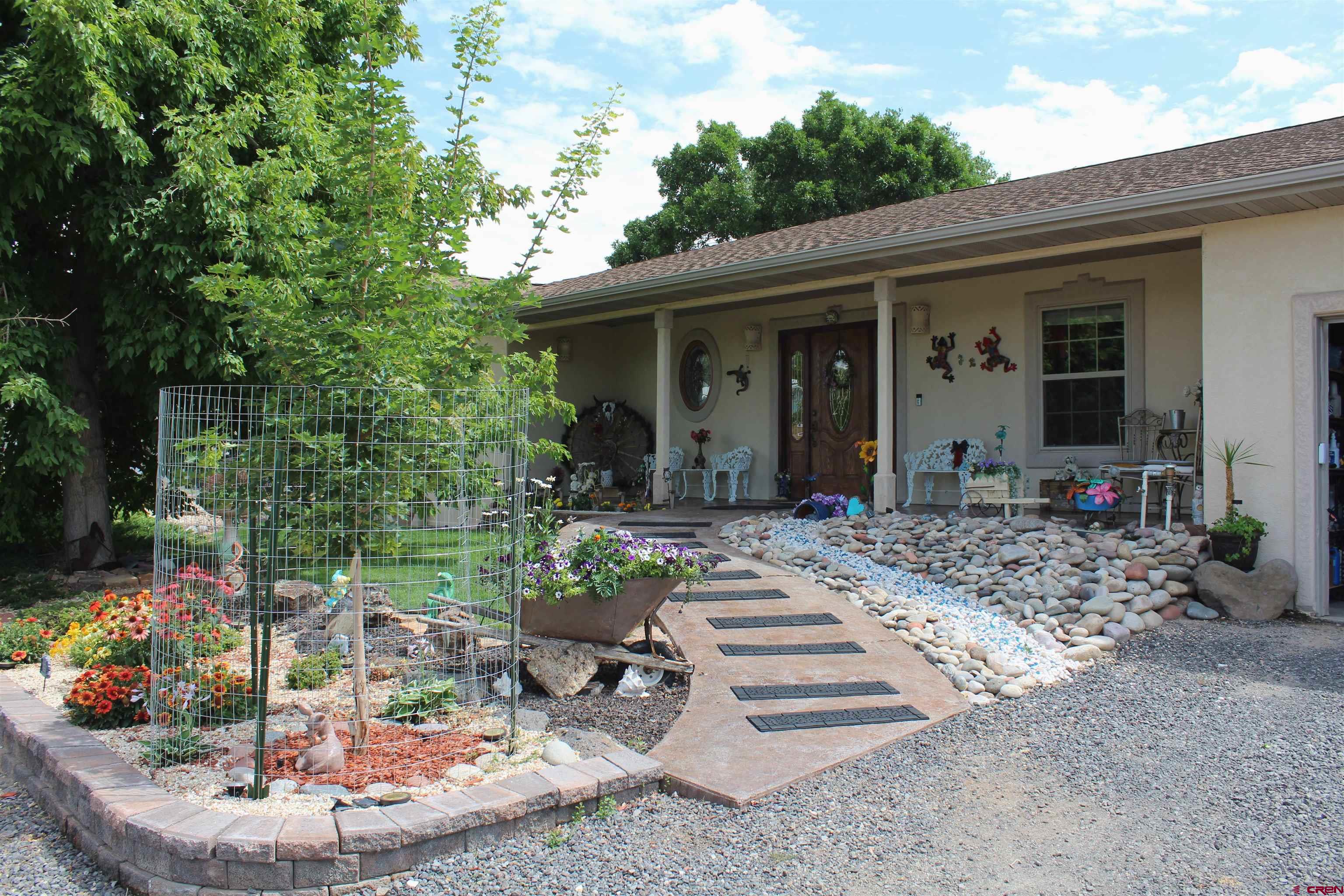 635 Northeast 2nd Street Cedaredge, CO 81413 - Photo 25 of 33 a view of a house with porch