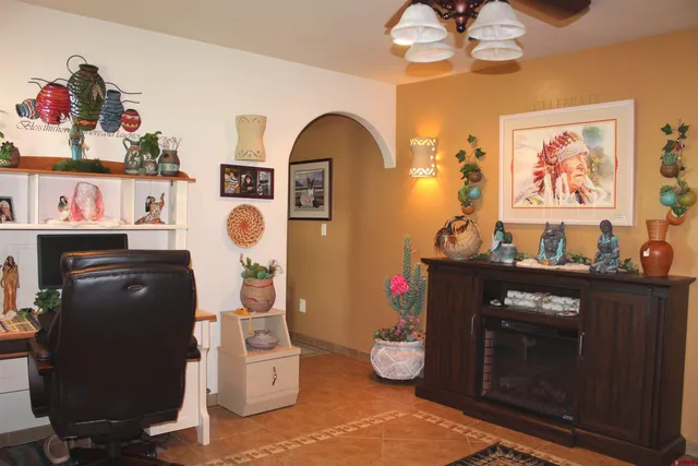 a living room with furniture and decor