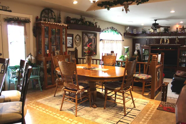 a view of a dining room with furniture