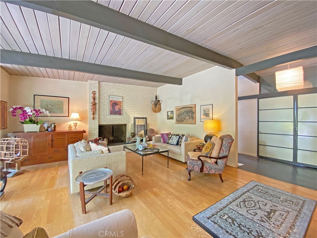 1543 Bates Place Claremont, CA 91711 - Photo 11 of 46 a living room with fireplace furniture and a rug