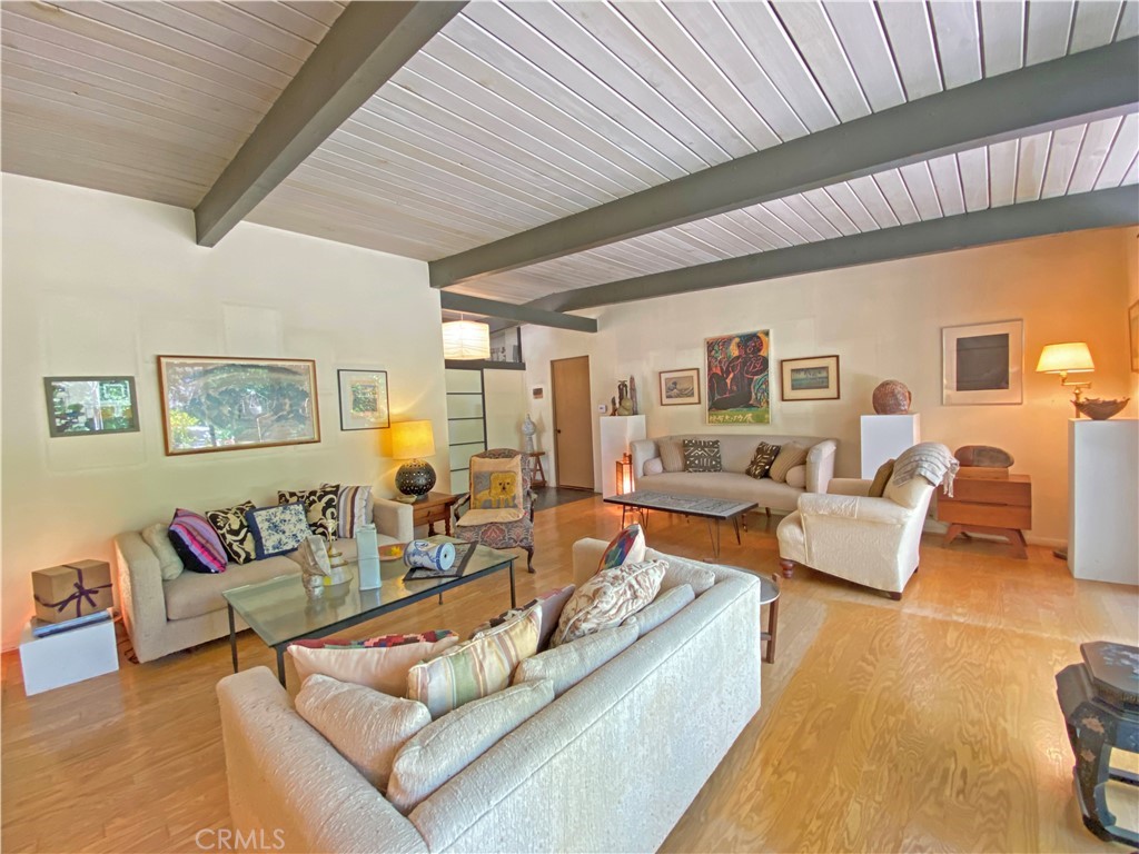 1543 Bates Place Claremont, CA 91711 - Photo 12 of 46 a living room with furniture and a wooden floor