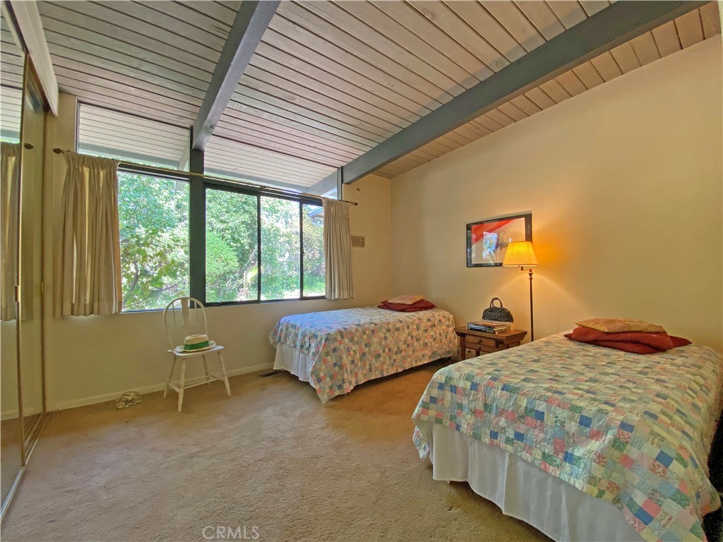 1543 Bates Place Claremont, CA 91711 - Photo 14 of 46 a bedroom with two beds and a large window