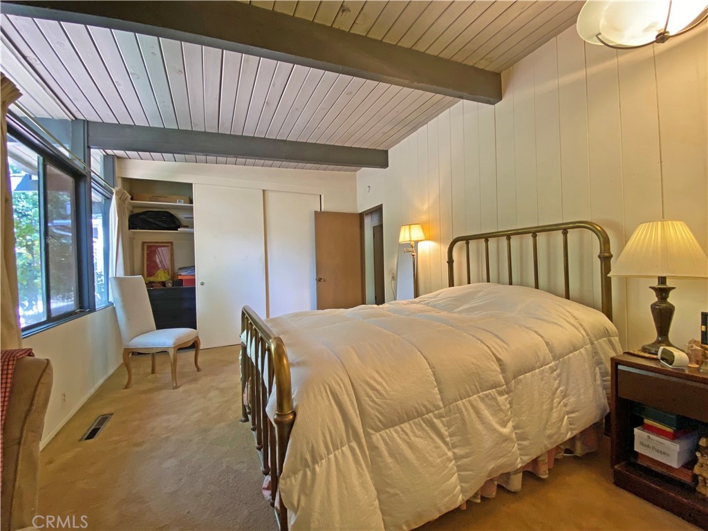 1543 Bates Place Claremont, CA 91711 - Photo 16 of 46 a bed sitting in a spacious bedroom next to a window