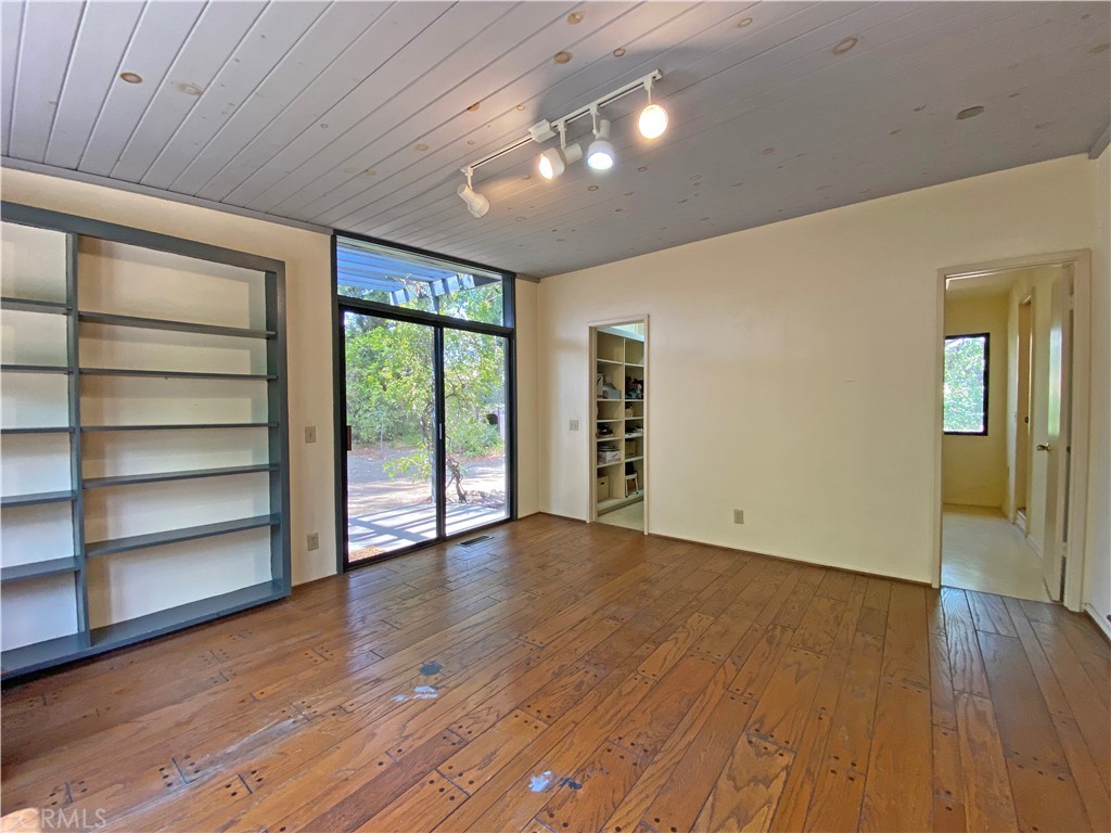 1543 Bates Place Claremont, CA 91711 - Photo 24 of 46 a view of an empty room with a window and wooden floor