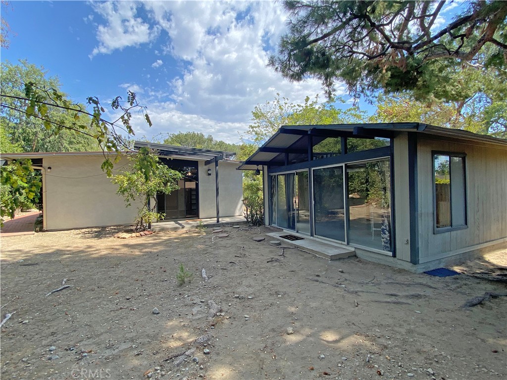 1543 Bates Place Claremont, CA 91711 - Photo 29 of 46 a front view of a house with a garden