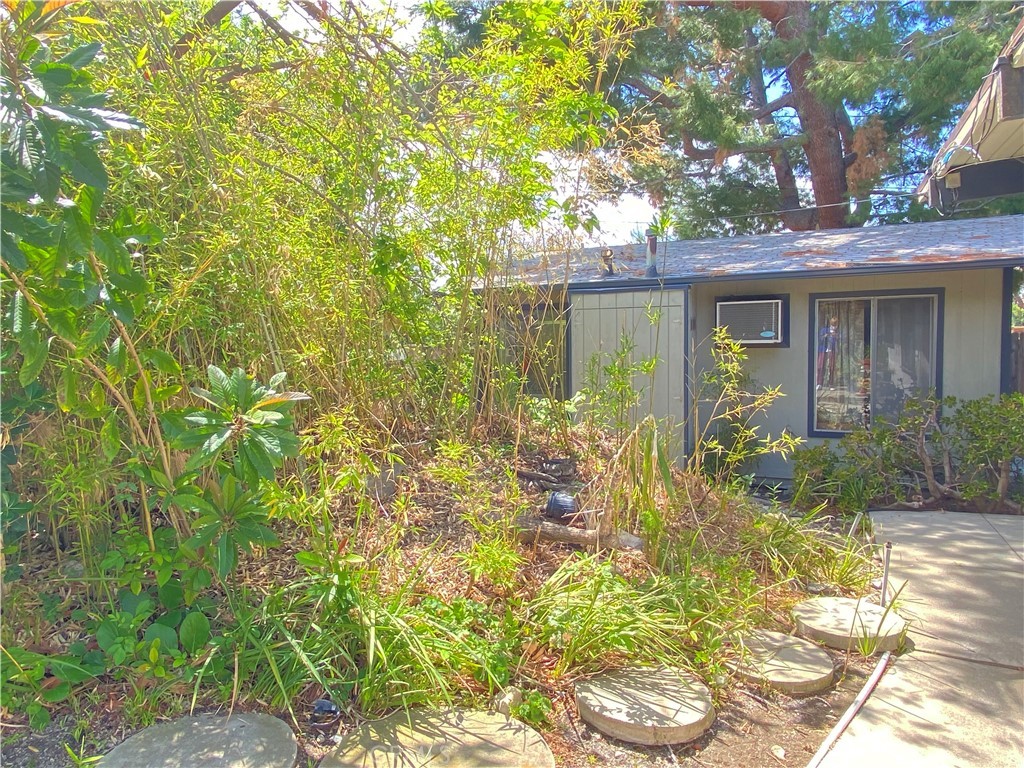 1543 Bates Place Claremont, CA 91711 - Photo 42 of 46 a front view of a house with a yard