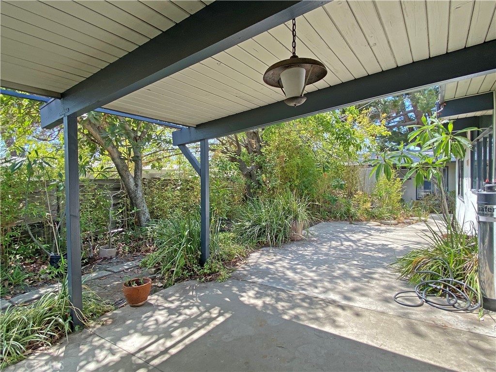 1543 Bates Place Claremont, CA 91711 - Photo 45 of 46 a backyard of a house with a garden and outdoor seating