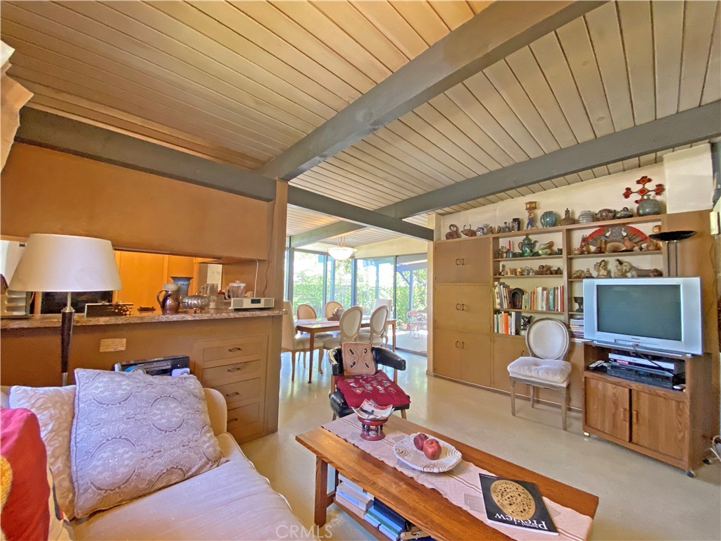 1543 Bates Place Claremont, CA 91711 - Photo 7 of 46 a living room with furniture and a flat screen tv