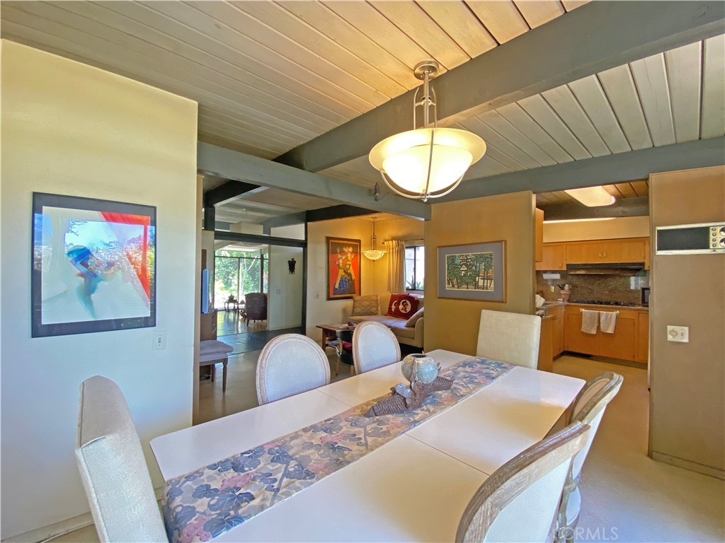 1543 Bates Place Claremont, CA 91711 - Photo 9 of 46 a view of a dining room with furniture window and wooden floor