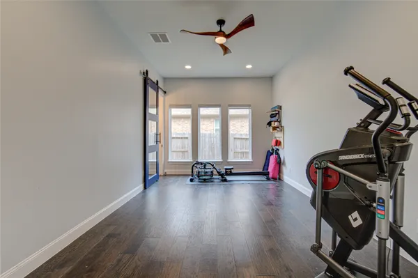 a view of a room with gym equipment