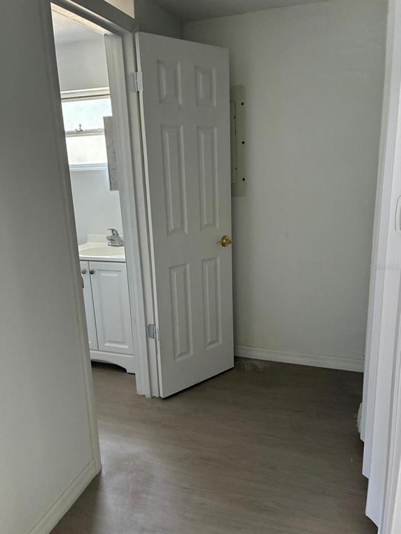 1008 Nebraska Street Leesburg, FL 34748 - Photo 11 of 26 an empty room with a door