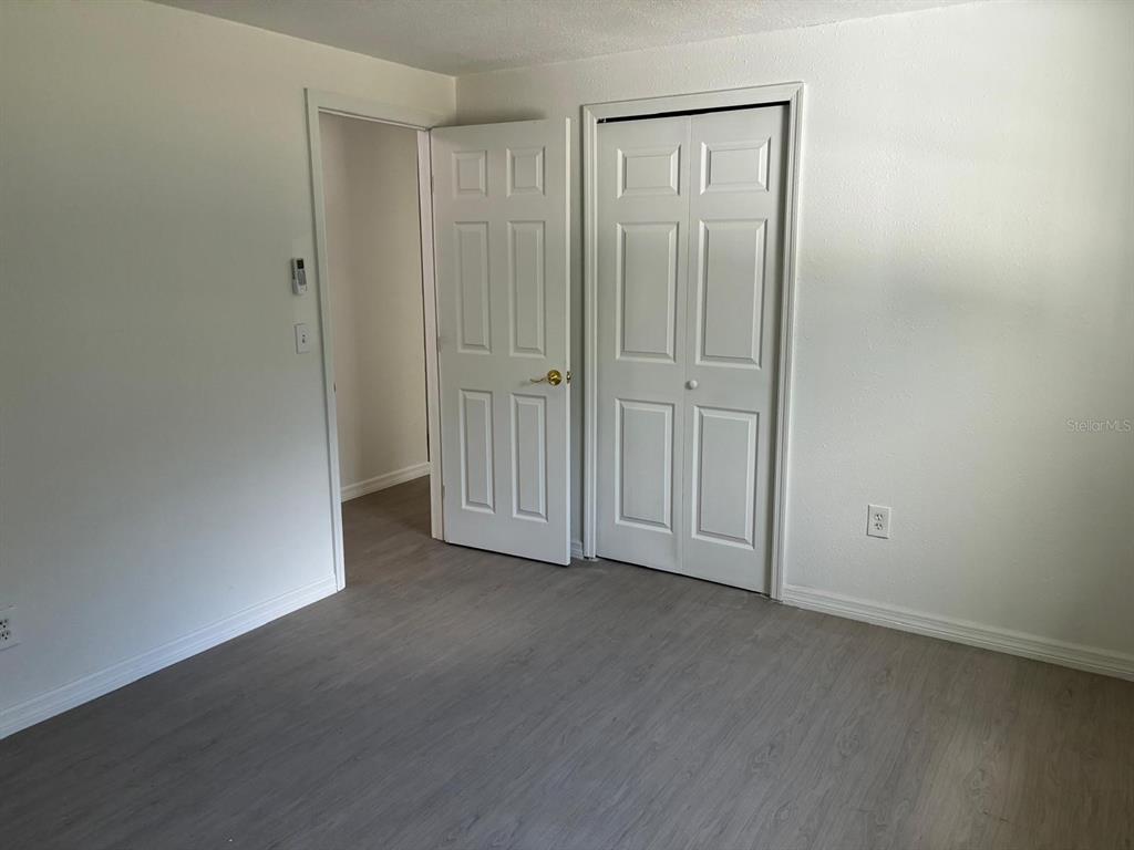 1008 Nebraska Street Leesburg, FL 34748 - Photo 15 of 26 an empty room with closet area