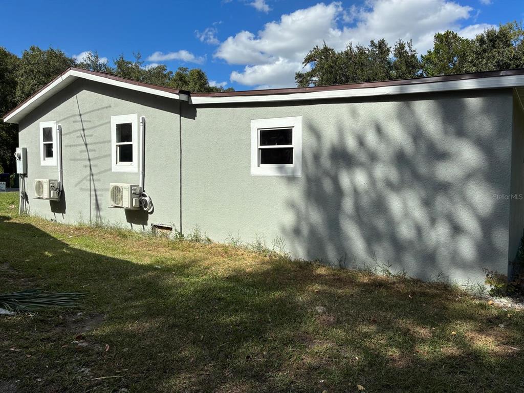 1008 Nebraska Street Leesburg, FL 34748 - Photo 24 of 26 a view of a house with a yard