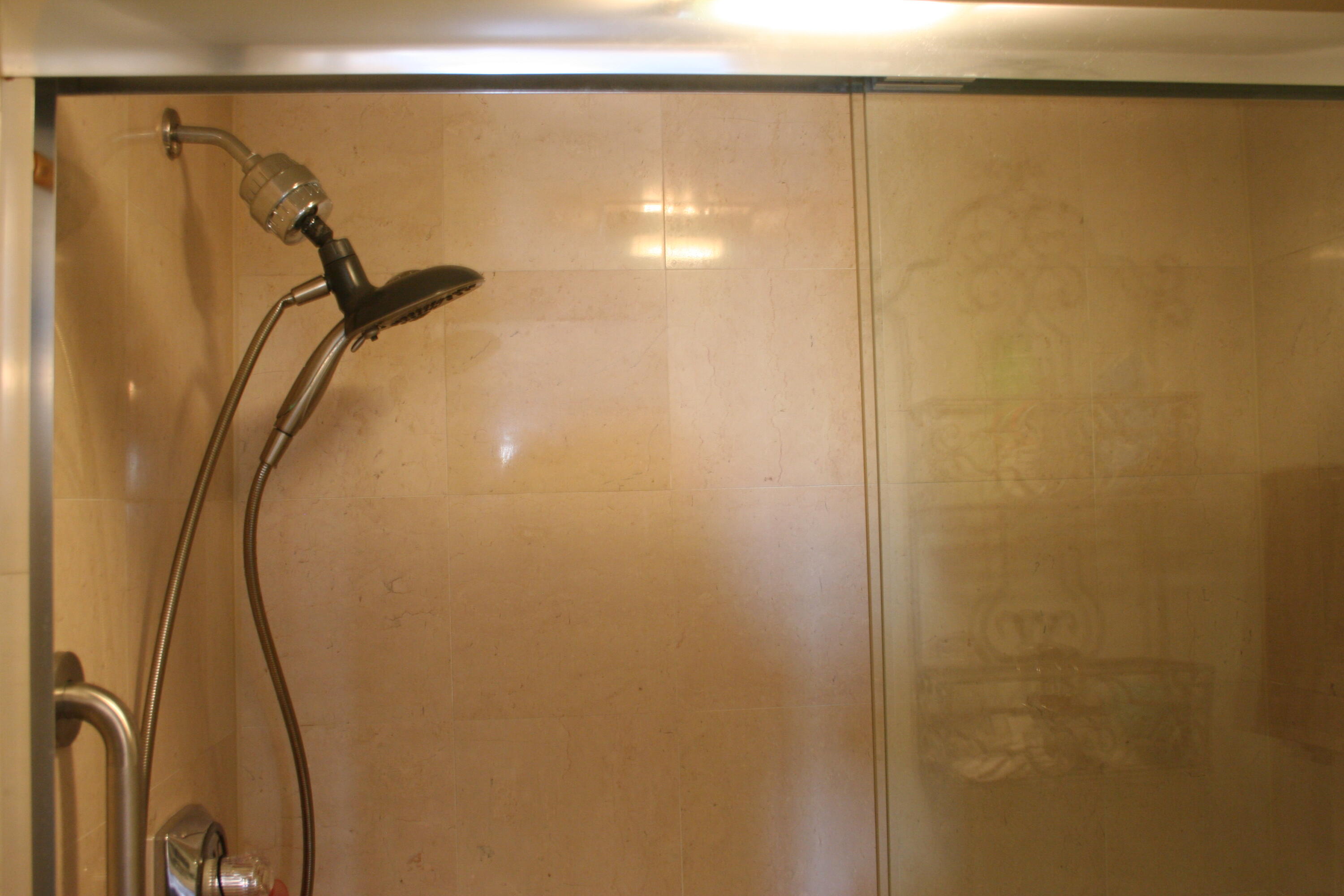 104500 Overseas Highway, Unit A302 Key Largo, FL 33037 - Photo 20 of 35 a bathroom with a shower