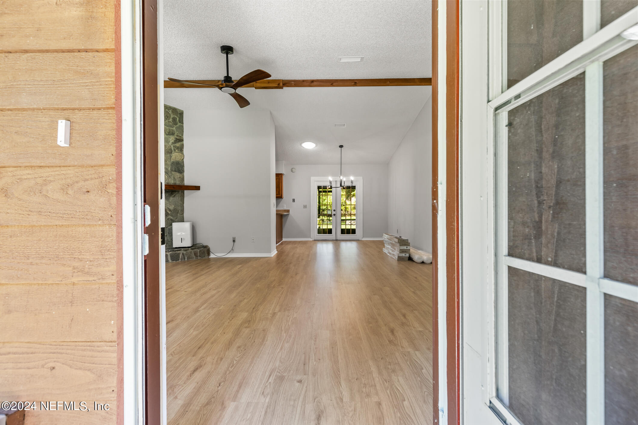 5165 Datil Pepper Road St. Augustine, FL 32086 - Photo 11 of 54 a view of a hallway view with wooden floor and staircase