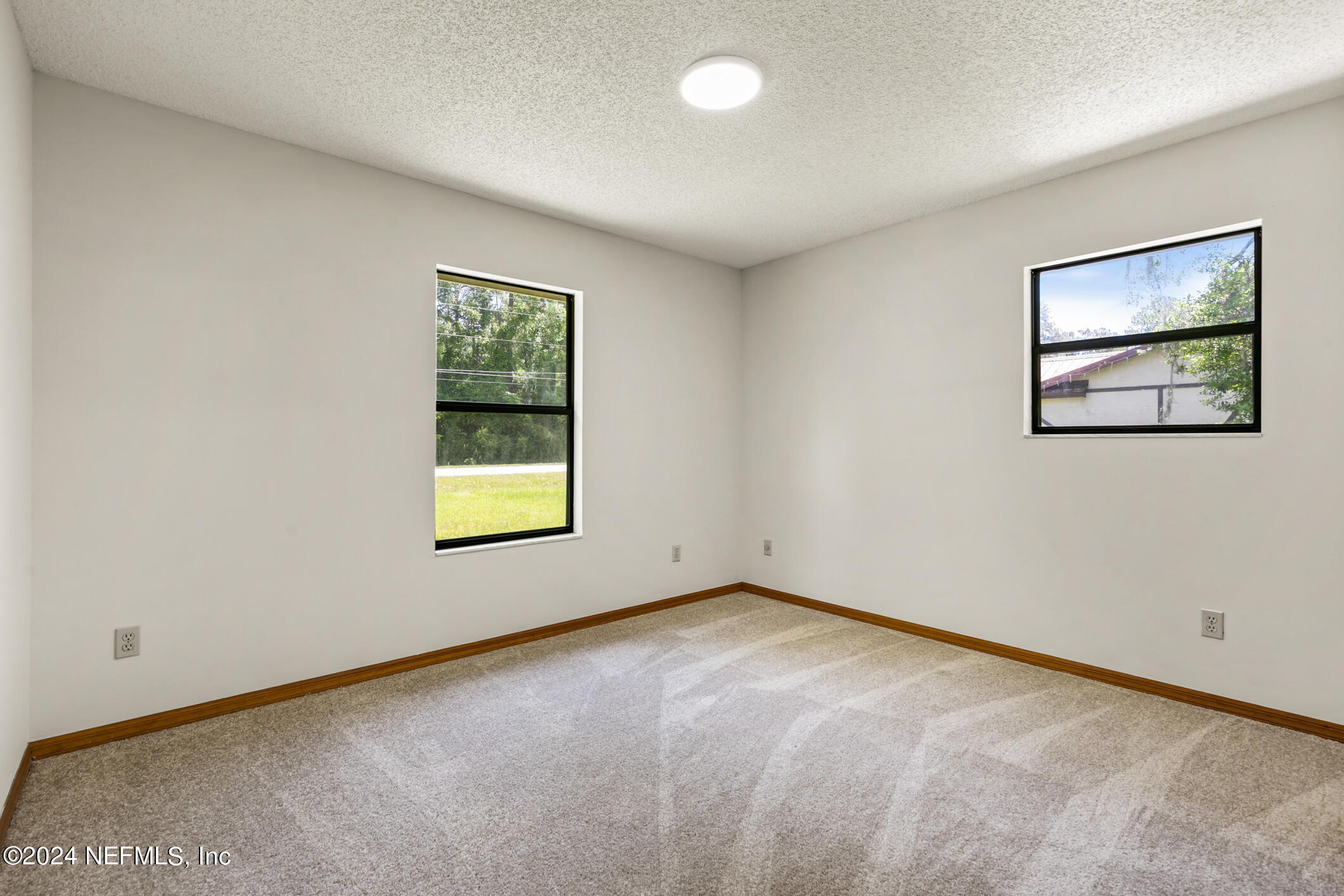 5165 Datil Pepper Road St. Augustine, FL 32086 - Photo 35 of 54 an empty room with a window