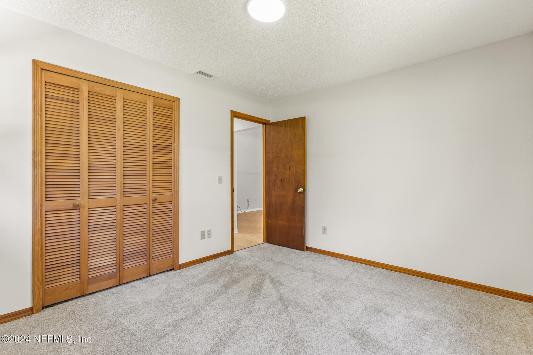 5165 Datil Pepper Road St. Augustine, FL 32086 - Photo 36 of 54 a view of an empty room with a window