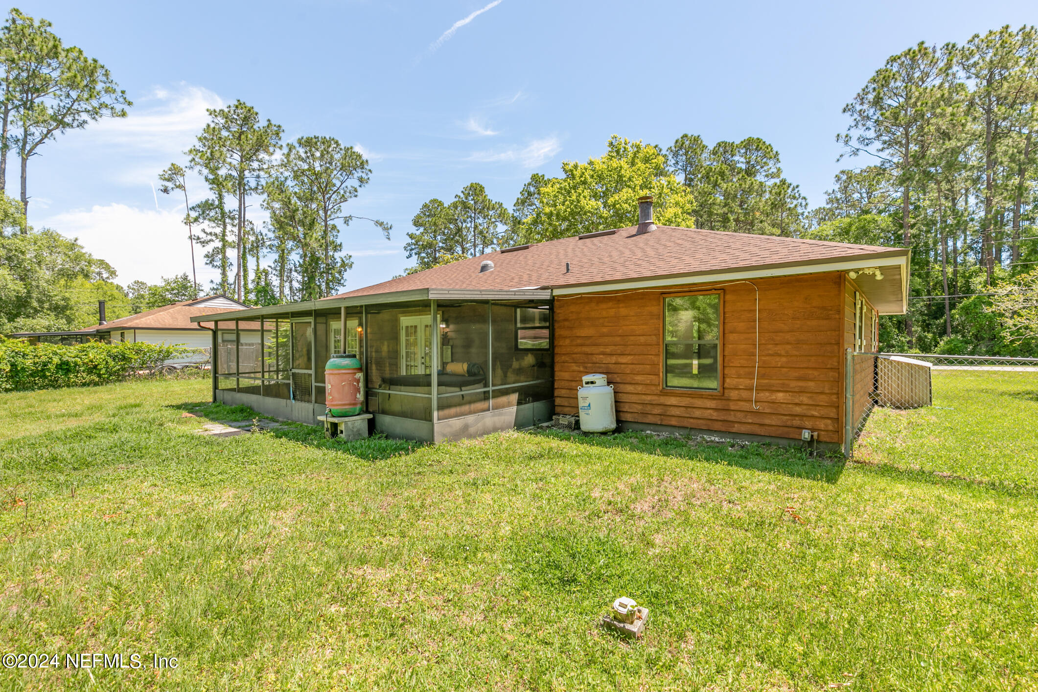 5165 Datil Pepper Road St. Augustine, FL 32086 - Photo 45 of 54 a view of a house with a yard
