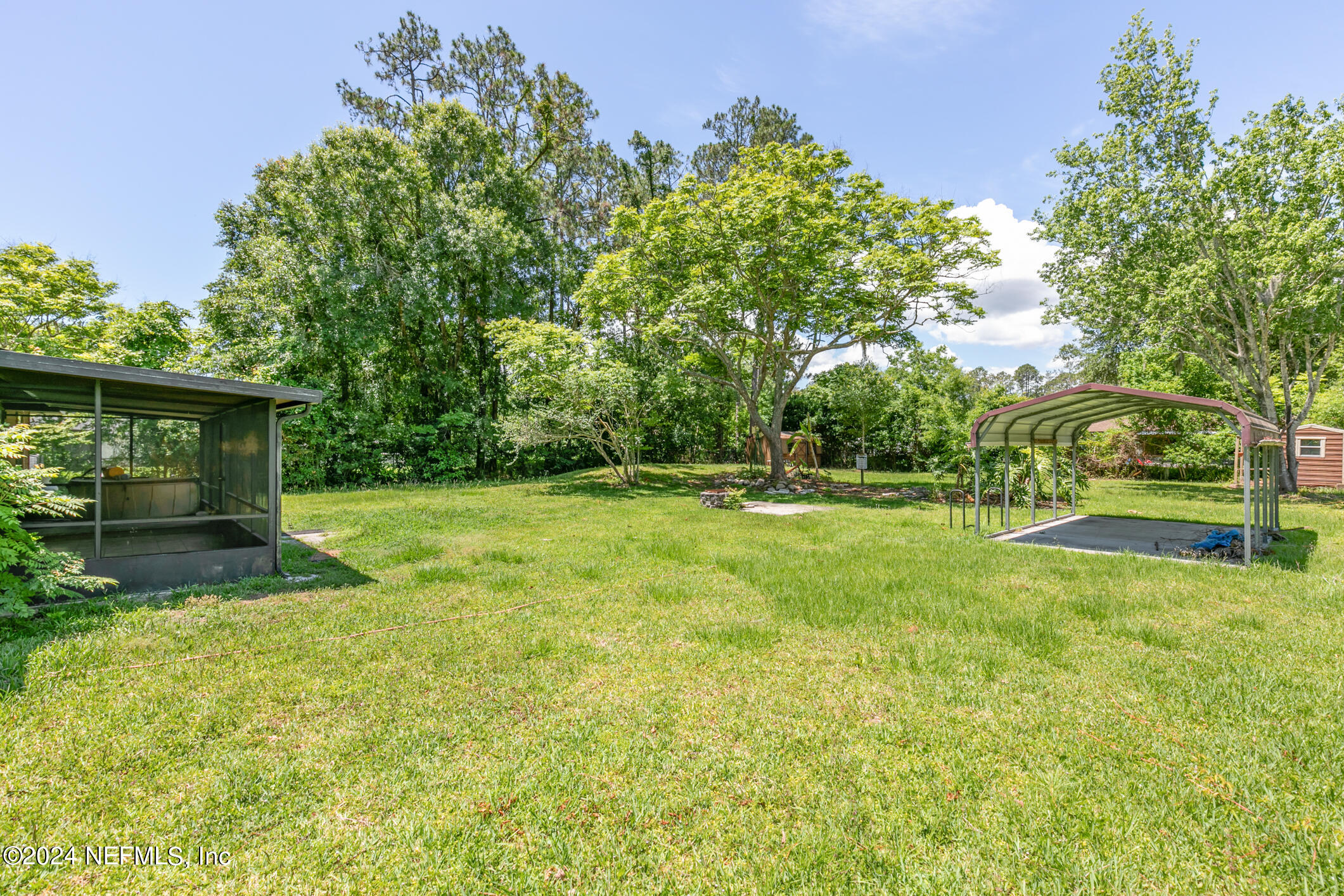 5165 Datil Pepper Road St. Augustine, FL 32086 - Photo 53 of 54 a view of backyard with a garden and entertaining space