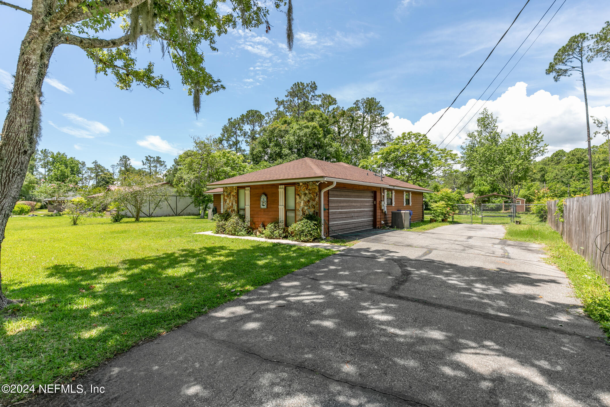 5165 Datil Pepper Road St. Augustine, FL 32086 - Photo 6 of 54 a front view of a house with garden