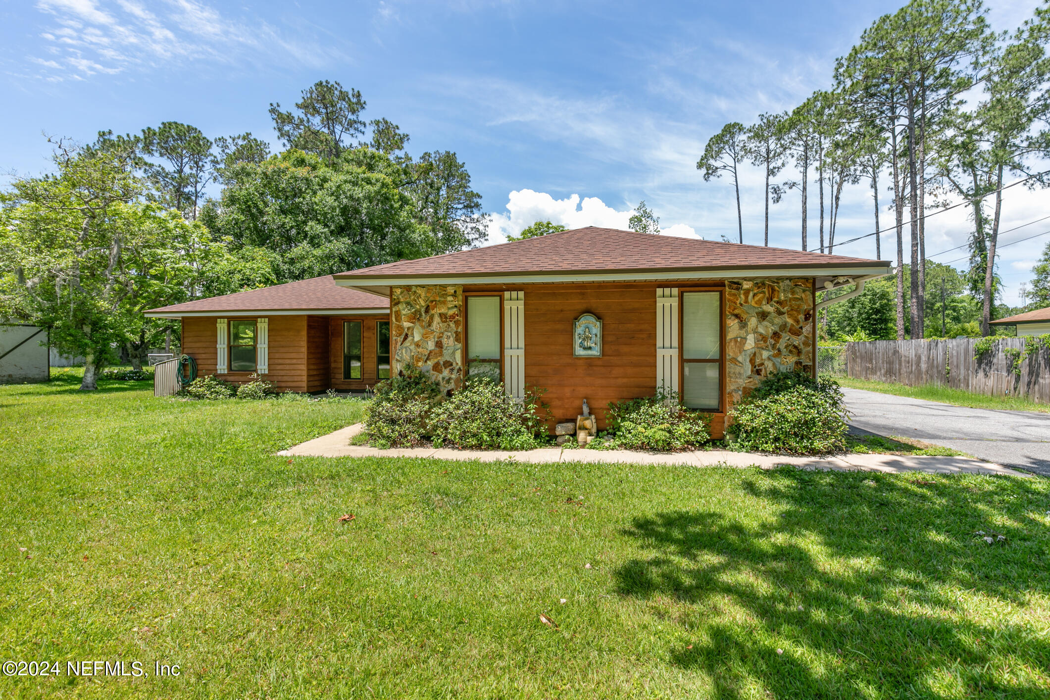 5165 Datil Pepper Road St. Augustine, FL 32086 - Photo 8 of 54 front view of a house with a yard
