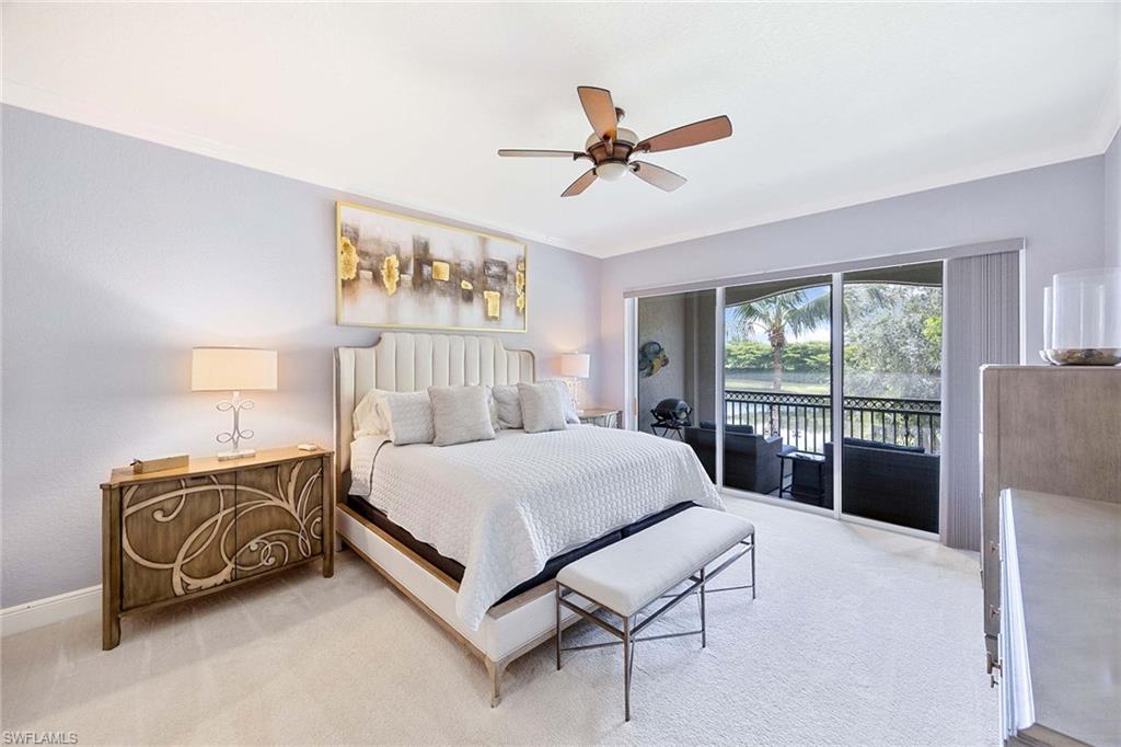 9202 Museo Circle, Unit 204 Naples, FL 34114 - Photo 18 of 37 a spacious bedroom with a bed and a window