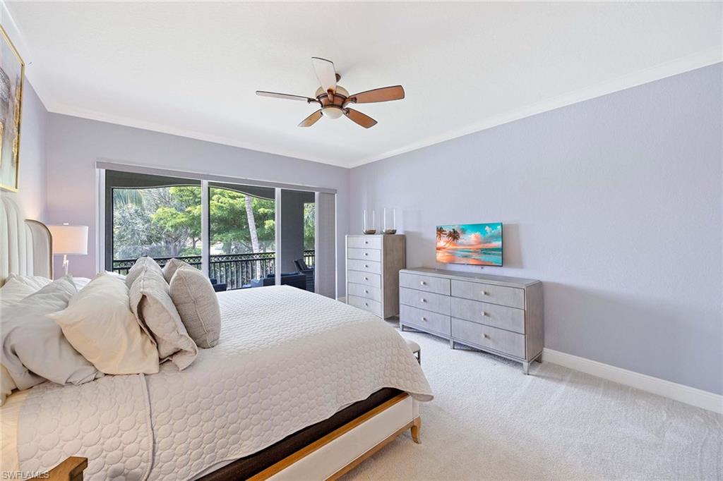 9202 Museo Circle, Unit 204 Naples, FL 34114 - Photo 19 of 37 a bedroom with a bed and a window