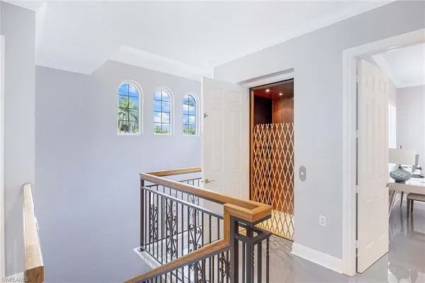 a view of room with furniture and wooden floor