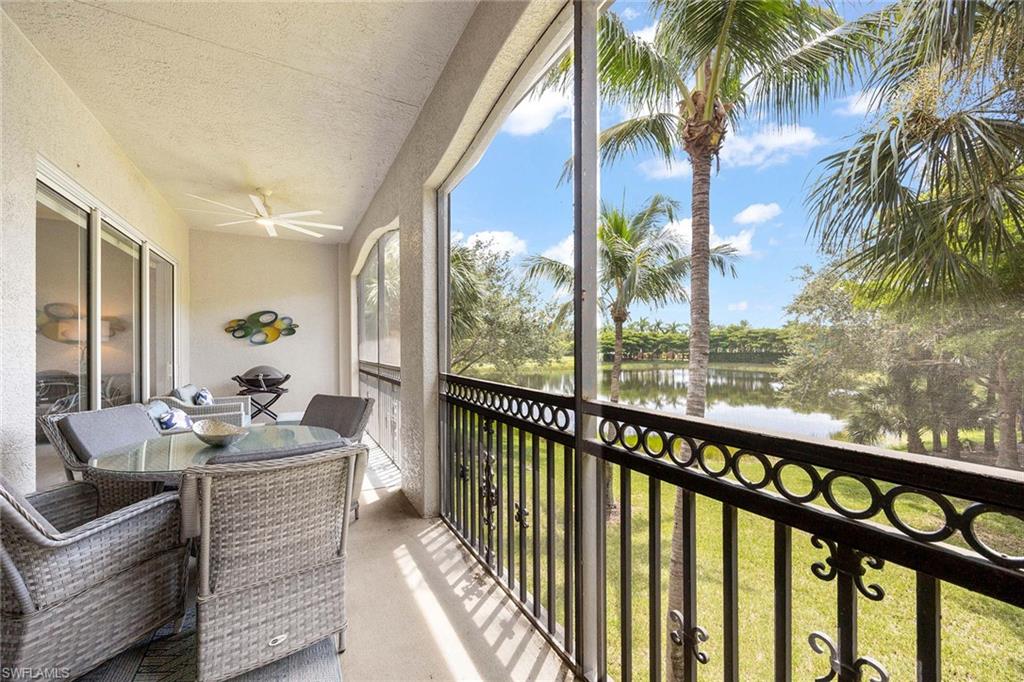 9202 Museo Circle, Unit 204 Naples, FL 34114 - Photo 32 of 37 a balcony with furniture and a potted plant