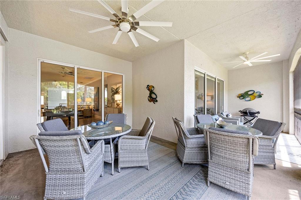 9202 Museo Circle, Unit 204 Naples, FL 34114 - Photo 33 of 37 a living room with furniture and a window