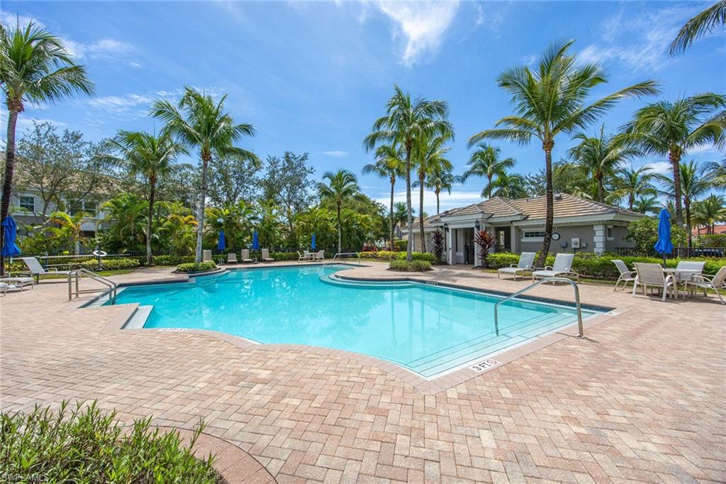 9202 Museo Circle, Unit 204 Naples, FL 34114 - Photo 36 of 37 a view of swimming pool with chairs