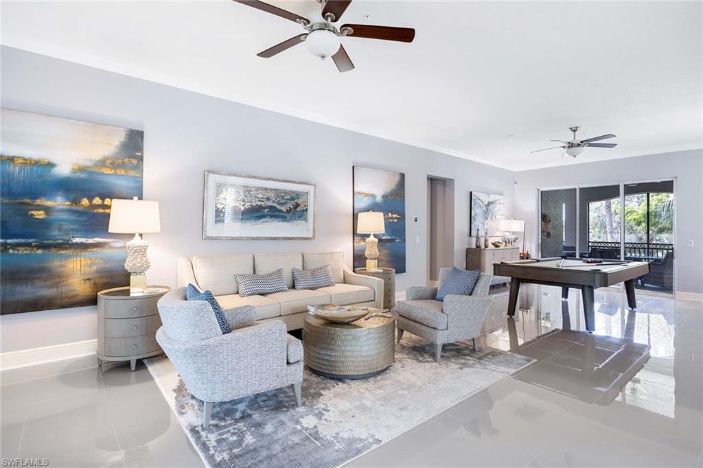 9202 Museo Circle, Unit 204 Naples, FL 34114 - Photo 6 of 37 a living room with furniture and a window