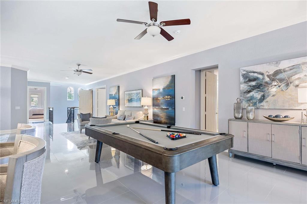 9202 Museo Circle, Unit 204 Naples, FL 34114 - Photo 10 of 37 a view of a dining room with furniture