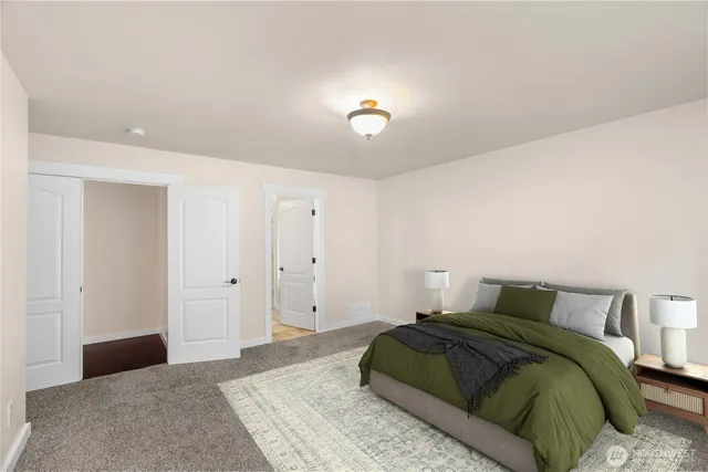 a bathroom with a granite countertop shower