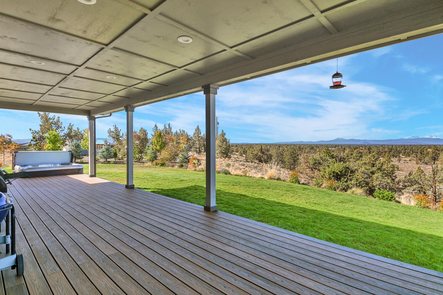 62860 Deschutes Road Bend, OR 97701 - Photo 15 of 34 Deck is low maintenance Trex type decking. Back yard is landscaped.