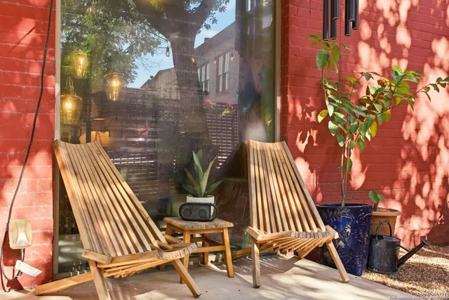 a view of balcony with wooden floor