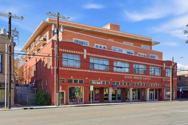 a view of a building with a street