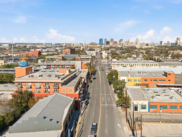 an aerial view of a city with lots of residential buildings
