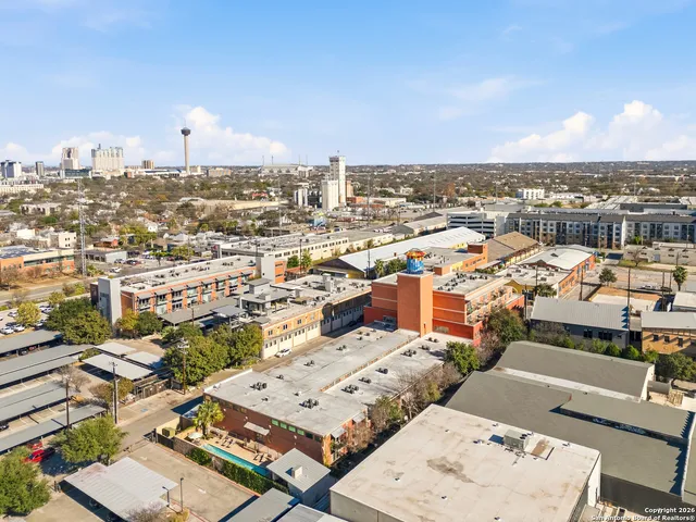 a view of a city with tall buildings