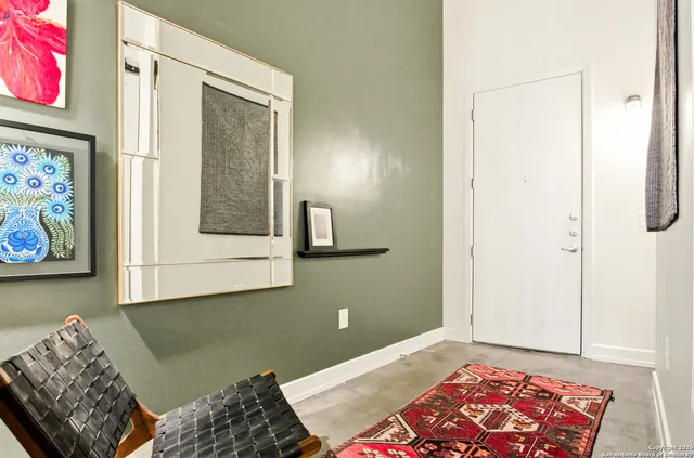 a bedroom with a bed and furniture