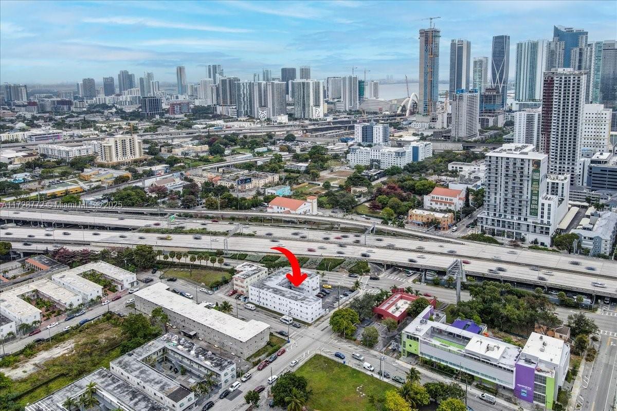 365 Northwest 8th Street, Unit 211 Miami, FL 33136 - Photo 24 of 29 a city view with tall buildings