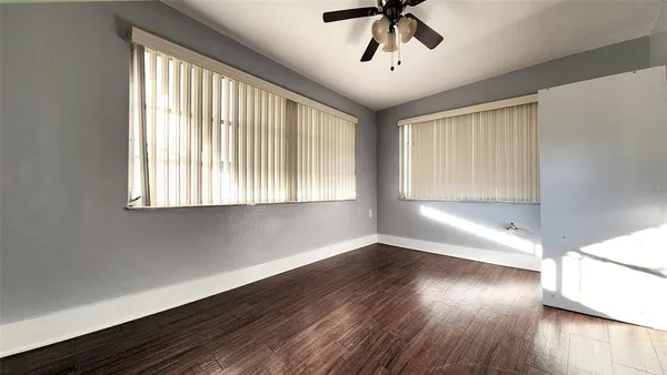 a view of a porch with a floor to ceiling window