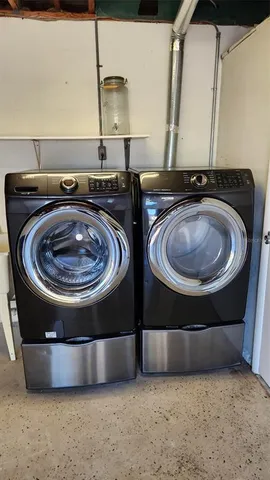 a bathroom with a sink toilet and a shower