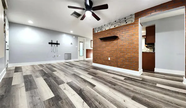a view of a livingroom with a ceiling fan