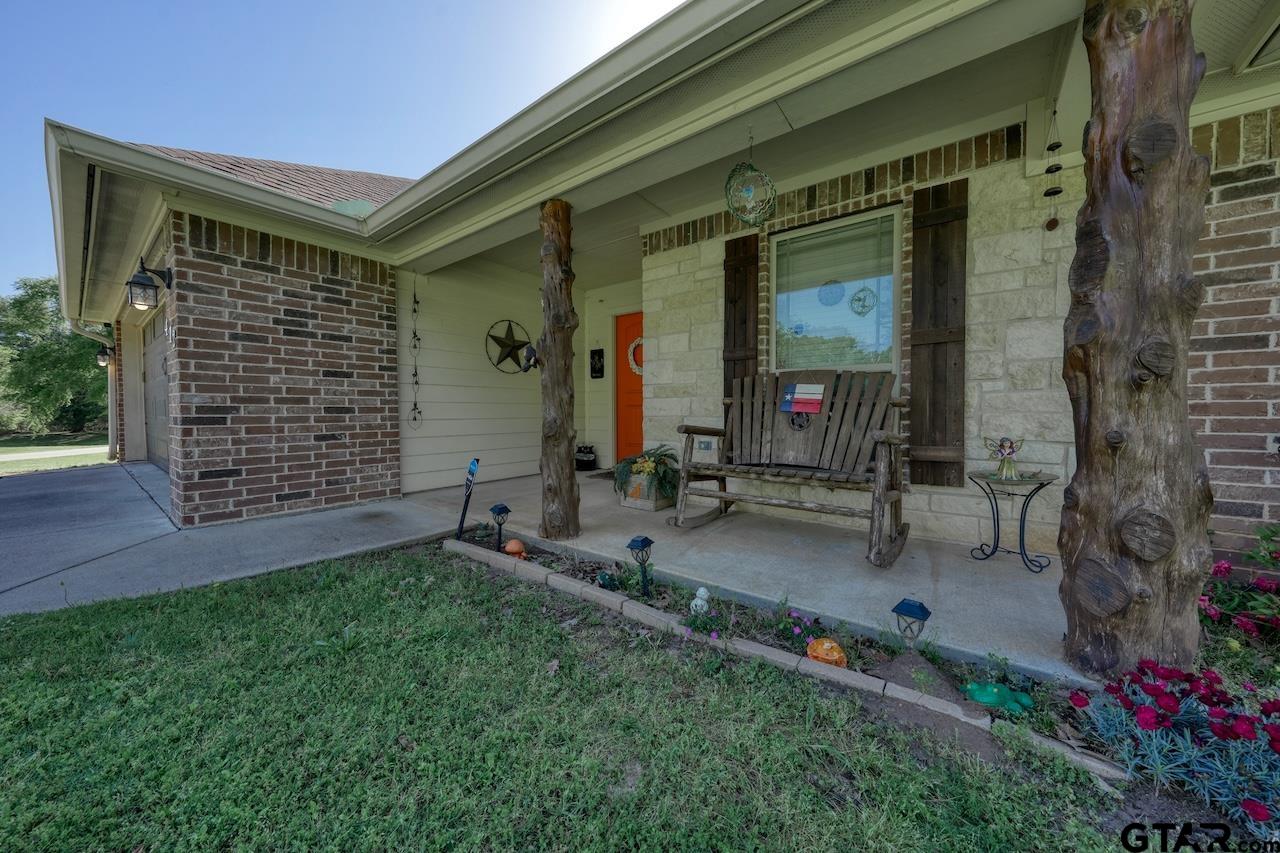 a backyard of a house with seating space