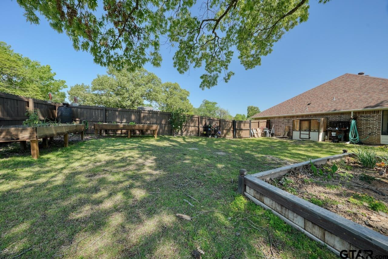 412 Elm Lane Lindale, TX 75771 - Photo 43 of 48 a view of house with yard and sitting area