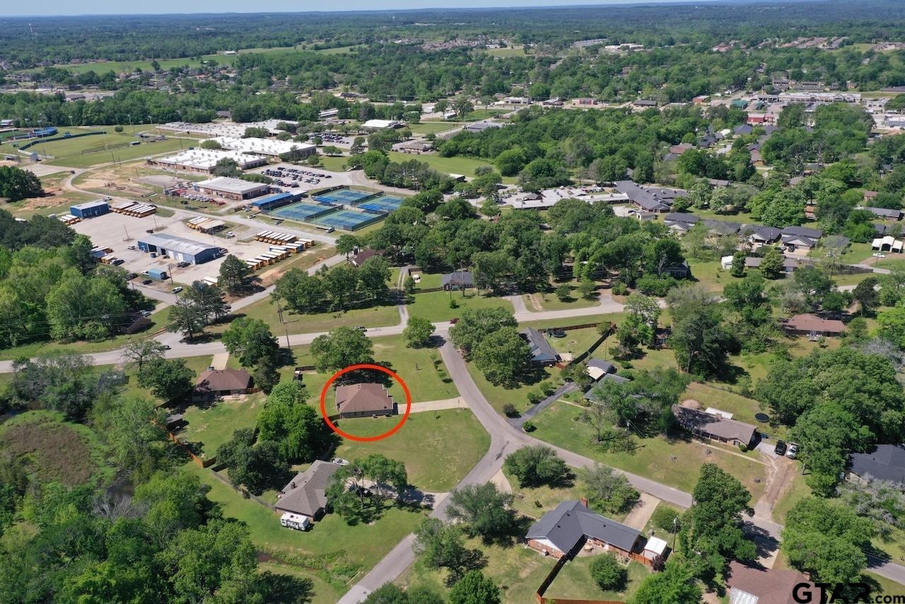 412 Elm Lane Lindale, TX 75771 - Photo 46 of 48 an aerial view of residential houses with outdoor space and trees